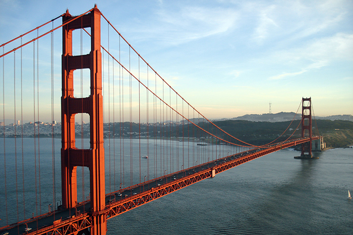The Golden Gate Bridge and San Francisco, CA at sunset