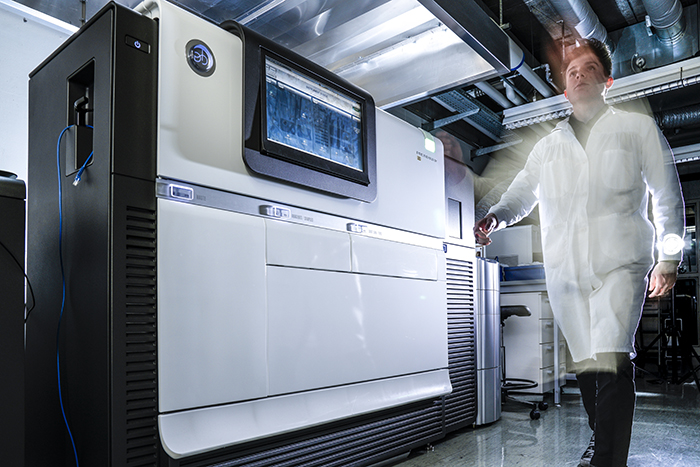 A scientist walking in a laboratory